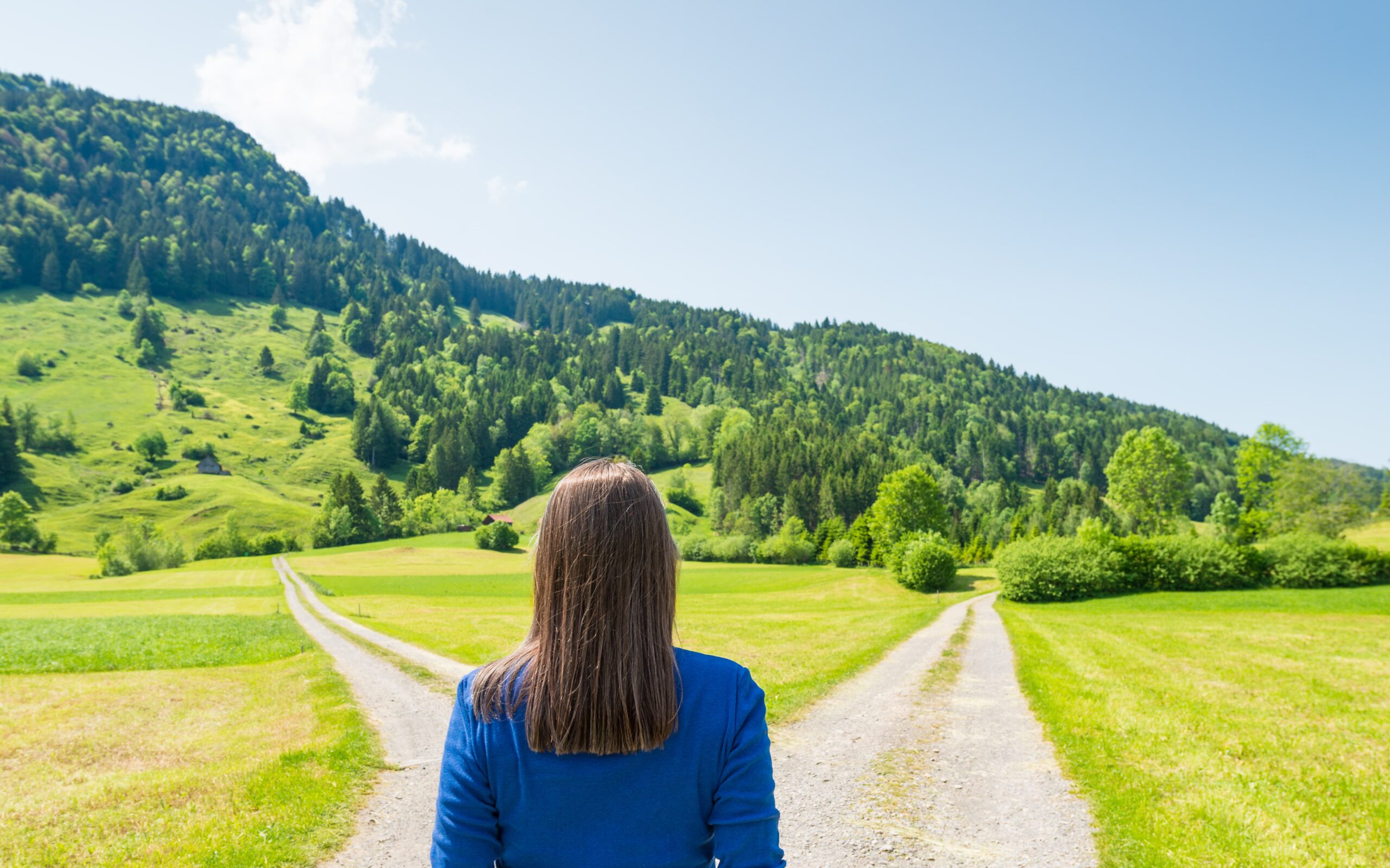 Young woman chooses between two options